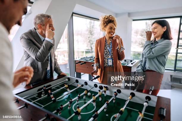 let the games begin - team building activity stock pictures, royalty-free photos & images