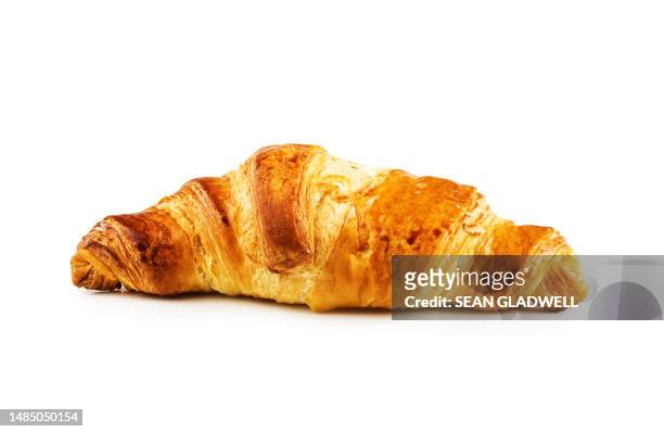 side view of croissant - croissant white background stock-fotos und bilder