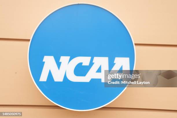 The NCAA logo on entrance sign outside of of the NCAA Headquarters on February 28, 2023 in Indianapolis, Indiana.
