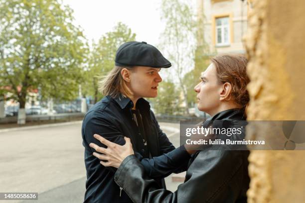 aggressive student strangling and grabbing the collar of a nerd, bullying in student life - dissent collar stock pictures, royalty-free photos & images