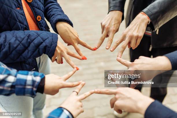 Fold Sign Hand 409 Folded Fingers Stock Photos, High-Res Pictures, and Images - Getty ...