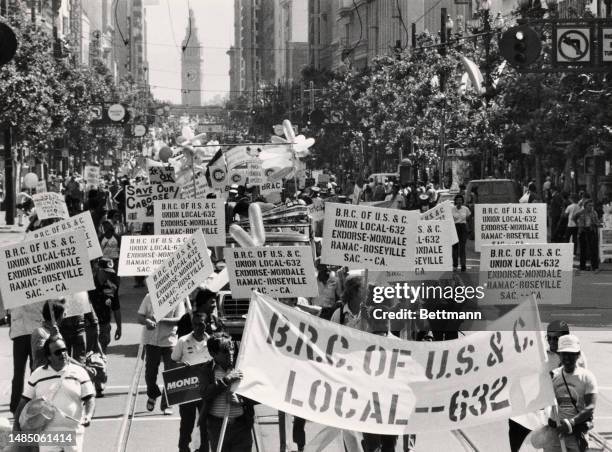 Thousands of union members march in an AFL-CIO-sponsored parade on the eve of the Democratic National Convention in San Francisco, California, July...