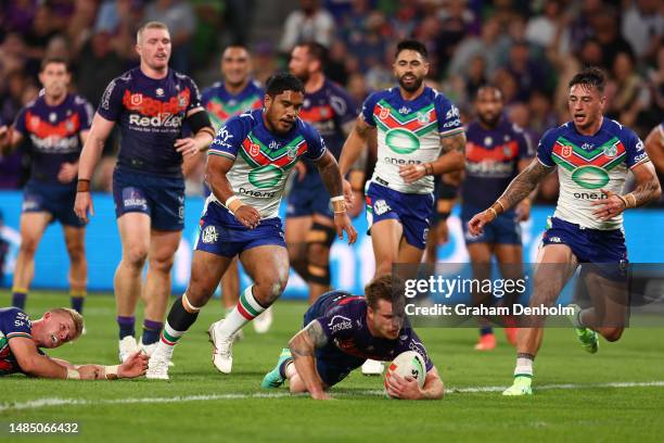 Cameron Munster of the Storm scores a try during the round eight NRL match between Melbourne Storm and New Zealand Warriors at AAMI Park on April 25,...