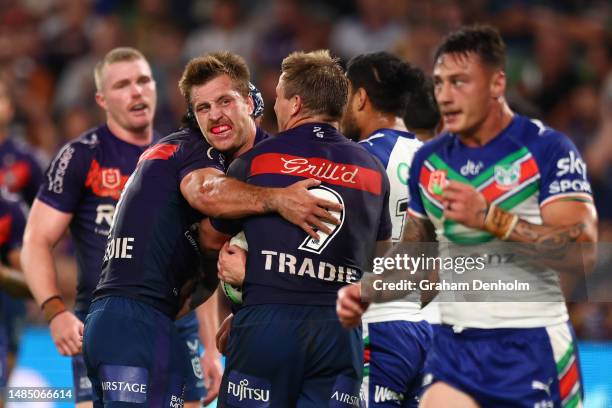 Cameron Munster of the Storm celebrates scoring a try during the round eight NRL match between Melbourne Storm and New Zealand Warriors at AAMI Park...