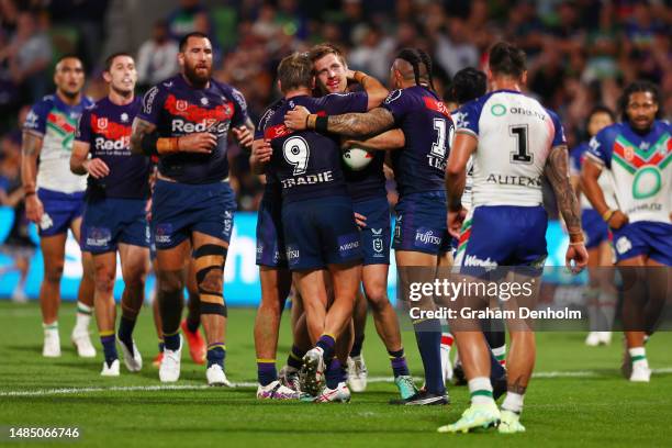 Cameron Munster of the Storm celebrates scoring a try during the round eight NRL match between Melbourne Storm and New Zealand Warriors at AAMI Park...
