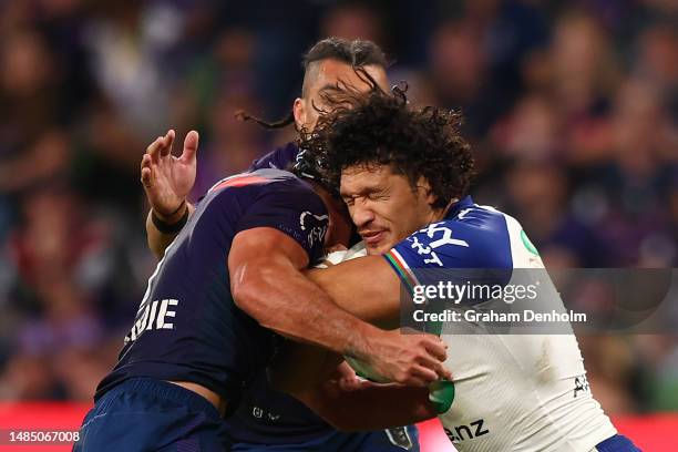 Dallin Watene-Zelezniak of the Warriors is tackled during the round eight NRL match between Melbourne Storm and New Zealand Warriors at AAMI Park on...