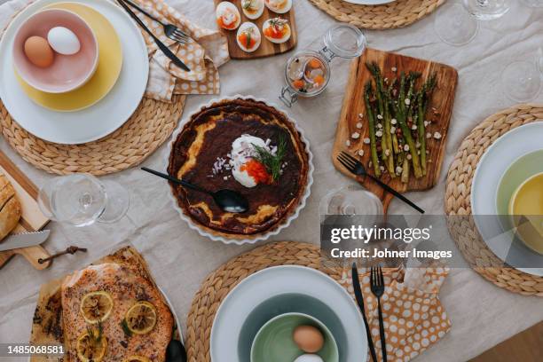 table set for easter meal - easter cake stock pictures, royalty-free photos & images