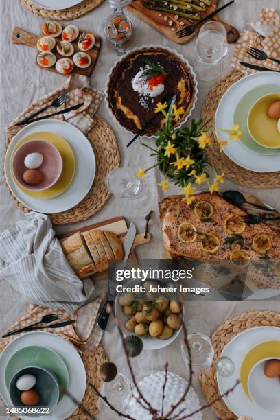 table set for easter meal - place setting stock pictures, royalty-free photos & images