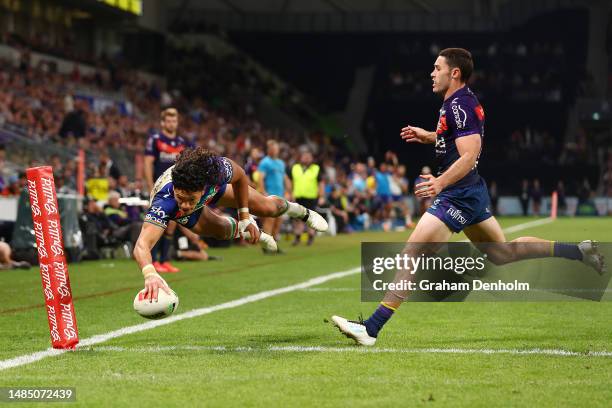 Dallin Watene-Zelezniak of the Warriors dives in to score a try during the round eight NRL match between Melbourne Storm and New Zealand Warriors at...