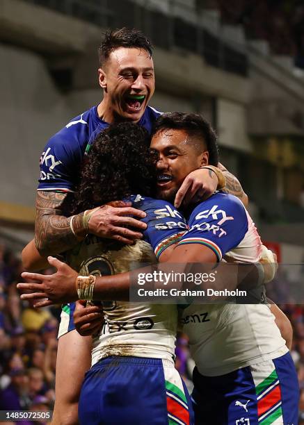 Dallin Watene-Zelezniak of the Warriors celebrates scoring a try during the round eight NRL match between Melbourne Storm and New Zealand Warriors at...