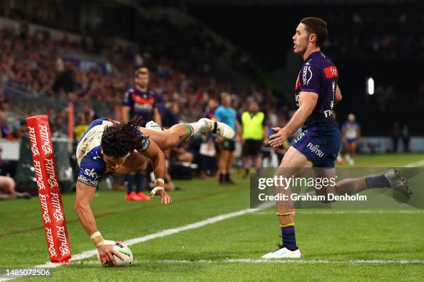 Dallin Watene-Zelezniak of the Warriors dives in to score a try during the round eight NRL match between Melbourne Storm and New Zealand Warriors at...
