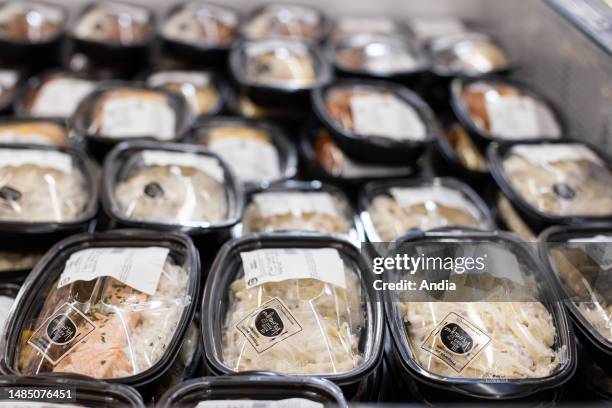 Fresh deli counter in a Cora hypermarket.