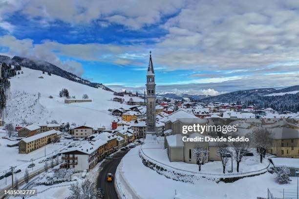 aerial view of the parish church of gallio dedicated to st. bartholomew the apostle - asiago italy stock pictures, royalty-free photos & images