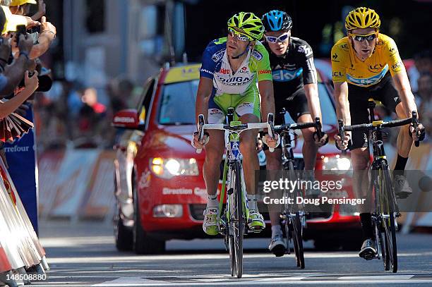 Vincenzo Nibali of Italy riding for Liquigas-Cannondale in 11th place, Christopher Froome of Great Britain riding for Sky Procycling in 13th place...