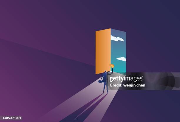 business man holding torch looking for exit and light - olympics torch stock illustrations