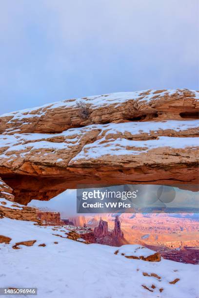 Washer Woman Arch & Monster Tower thru Mesa Arch in winter in the Island in the Sky District of Canyonlands NP, Utah.