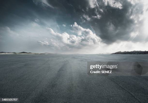 storm skies, road background - rain road stock pictures, royalty-free photos & images