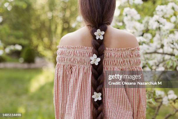 woman with beautiful long brunette hair - summer hair care stock pictures, royalty-free photos & images