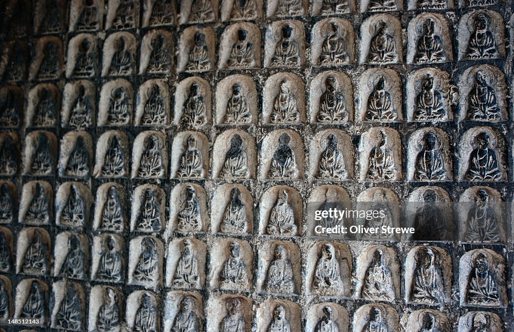 Longmen Grottoes or the Dragon Gate Grottoes are one of China's three great Buddhist grotto art treasures.