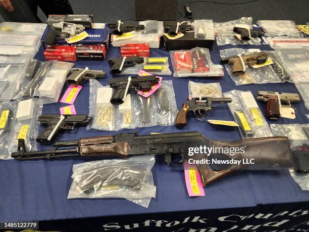 Confiscated guns on display during a press conference at the district attorneys office in Riverhead, New York on April 24, 2023. Suffolk County...