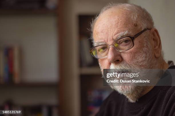 shot of a senior man with eyedlasses - brain exhaustion stock pictures, royalty-free photos & images