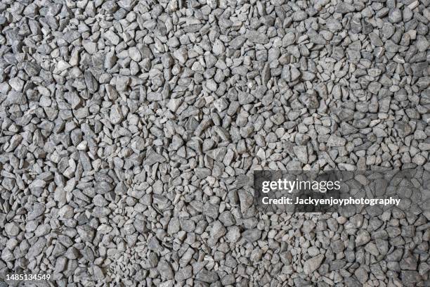 abstract dry pebbles stones gray toned background - 玉砂利 ストックフォトと画像