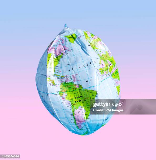 deflating earth - physical pressure stock pictures, royalty-free photos & images