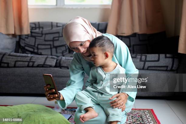 selamat hari raya aidilfitri - selamat hari raya aidilfitri stock pictures, royalty-free photos & images