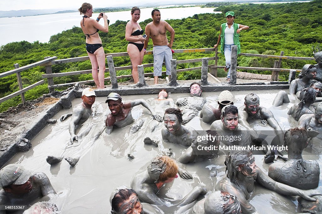 Bathers floating in mud, with supposed skin-enhancing qualities, of Volcan El Totumo.