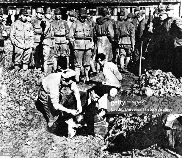 Chinese civilians buried alive by Japanese soldiers during Nanking Massacre 1937, Part of the Japanese invasion of China.