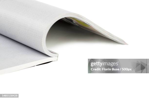 close-up of book against white background,romania - open romania imagens e fotografias de stock