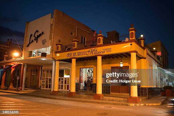 casa de la musica building at dusk. - musica stock pictures, royalty-free photos & images