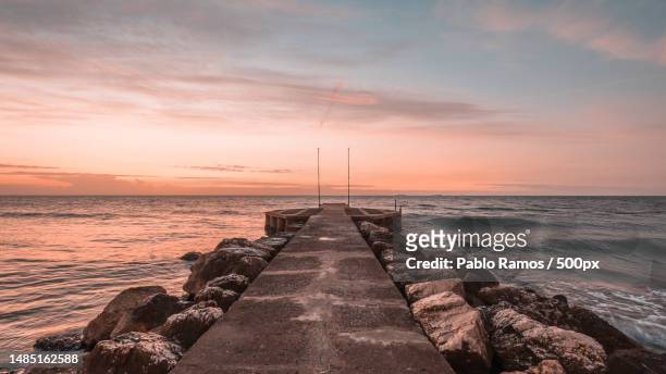 scenic view of sea against sky during sunset - ecossistema stock pictures, royalty-free photos & images