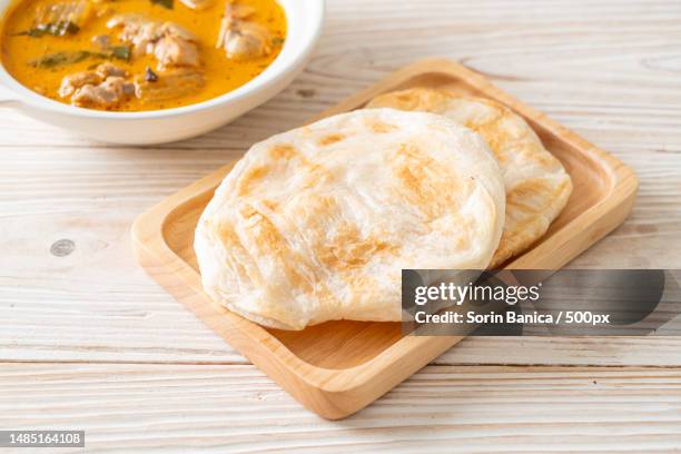 close-up of bread on table - naan stock pictures, royalty-free photos & images