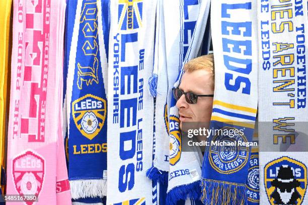 Leeds United merchandise seller looks on prior to the Premier League match between Leeds United and Leicester City at Elland Road on April 25, 2023...