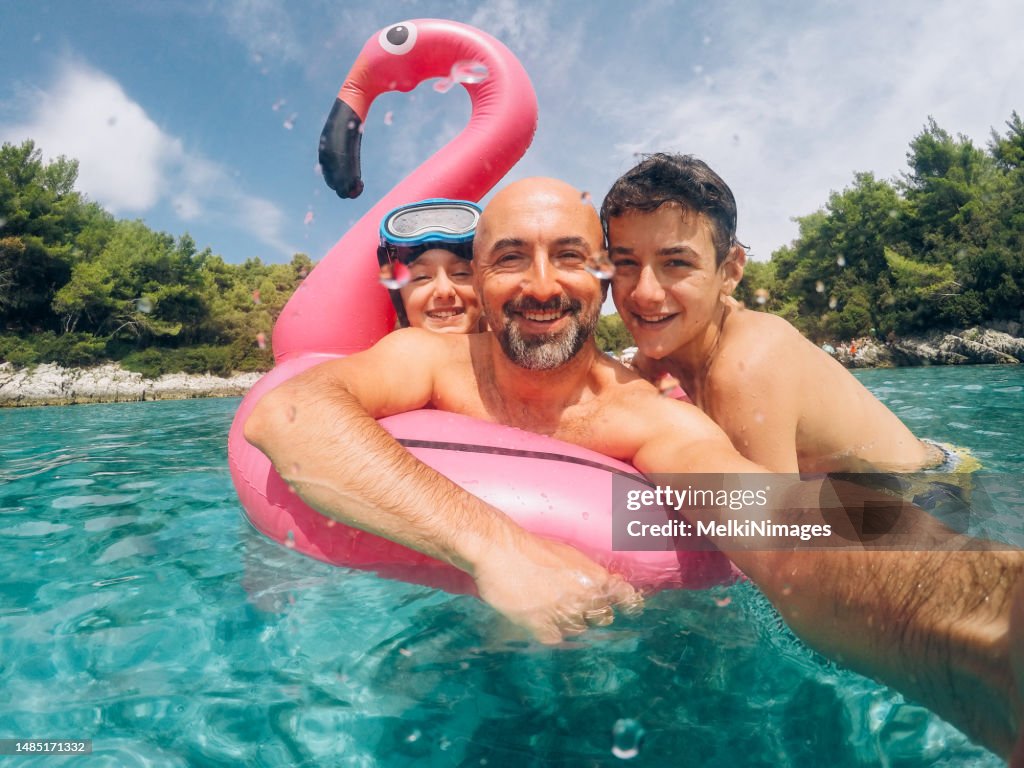 Family Taking A Selfie On Their Vacation