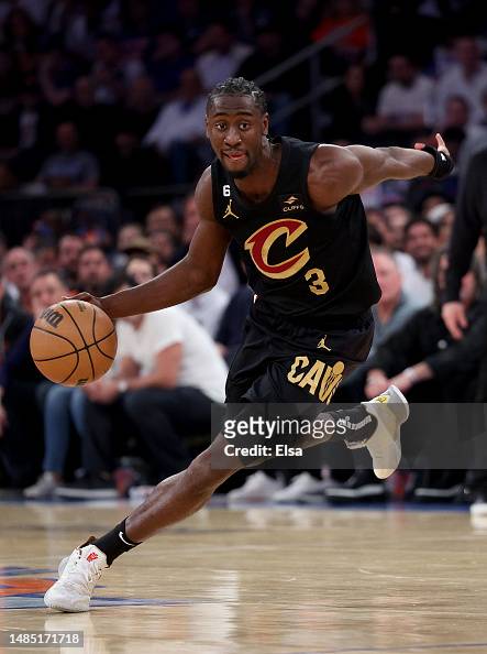Caris LeVert of the Cleveland Cavaliers drives to the net during Game ...
