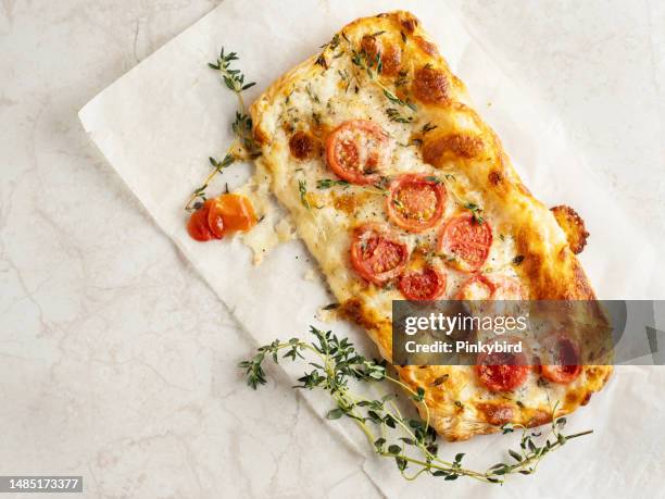puff pastry pizza, pizza made from puff pastry with cheese, and tomato with thyme leaves, puff pastry margharita pizzas, tomato tart, pastry pita bread, savory tarts, tomato quiche - puff pastry stock pictures, royalty-free photos & images