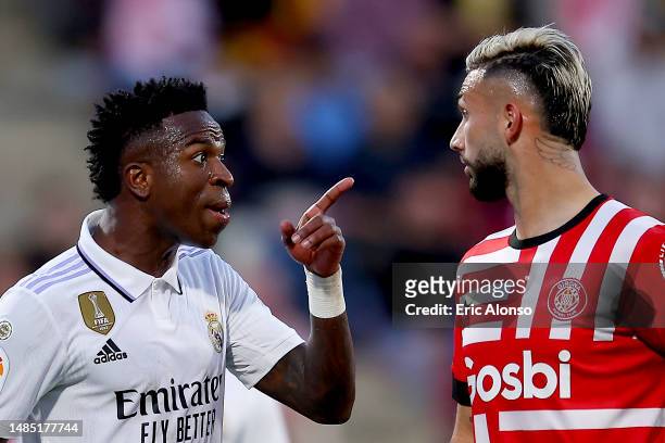 Vinicius Junior of Real Madrid argue with Valentin Castellanos of Girona FC during the LaLiga Santander match between Girona FC and Real Madrid CF at...