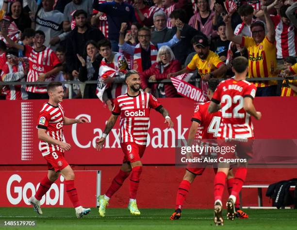 Valentin Castellanos of Girona FC celebrates with teammates after scoring the team's second goal during the LaLiga Santander match between Girona FC...
