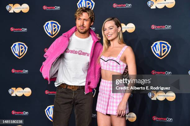 Ryan Gosling and Margot Robbie attend the State of the Industry and Warner Bros. Pictures Presentation at The Colosseum at Caesars Palace during...