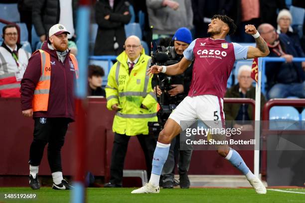 Tyrone Mings of Aston Villa celebrates after scoring the team's first goal during the Premier League match between Aston Villa and Fulham FC at Villa...