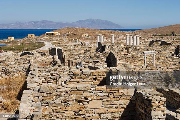 ruins, delos, cyclades islands. - delos stock-fotos und bilder