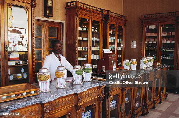 pharmacist in pharmacy. - asmara eritrea stock pictures, royalty-free photos & images