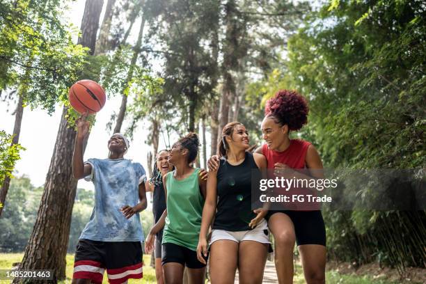 basketball female friends walking on a public park - brazil and outside and ball stock pictures, royalty-free photos & images