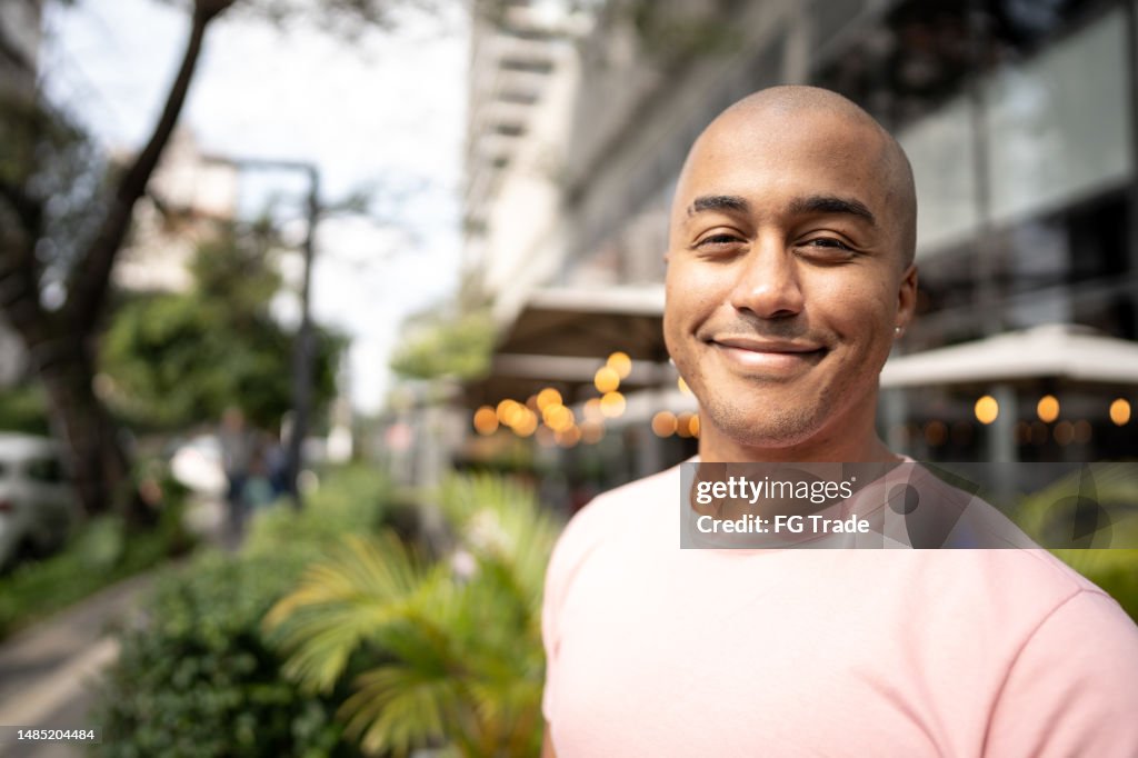 Portrait of a young man in the street