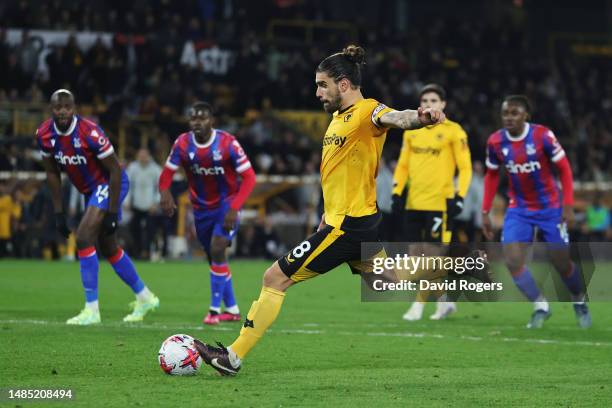 Ruben Neves of Wolverhampton Wanderers scores the team's second goal from the penalty spot during the Premier League match between Wolverhampton...