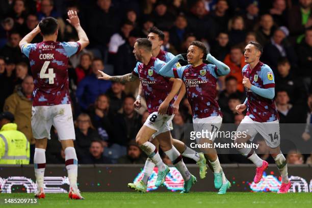 Manuel Benson of Burnley celebrates with teammates after scoring the team's first goal during the Sky Bet Championship match between Blackburn Rovers...