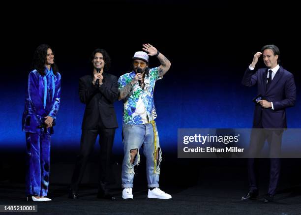 Bruna Marquezine, Xolo Maridueña, Angel Manuel Soto, and Co-Chairman and CEO of DC Studios Peter Safran speak onstage as they promote the upcoming...