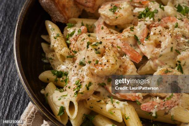 creamy parmesan garlic shrimp - penne stock pictures, royalty-free photos & images